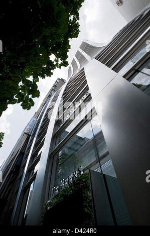 DeBeers diamond trader retail outlet alloggiato in un unica facciata curvo edificio nel raffinato quartiere di Ginza del centro cittadino di Tokyo. Foto Stock