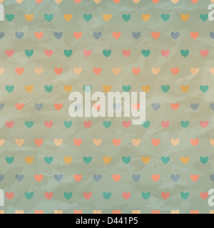 Retrò seamless con cuori di colore sulla vecchia carta sgualcita. Foto Stock
