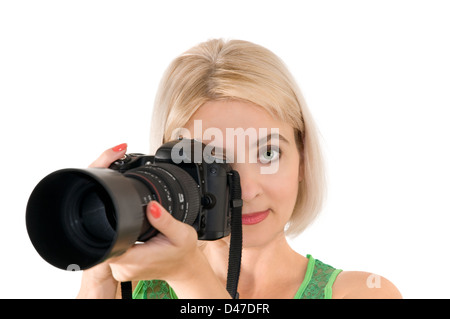 La signora - fotografo è fotografato sullo sfondo bianco Foto Stock