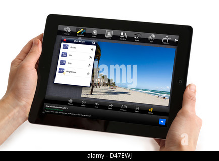 Modifica di una fotografia con il Fotolr HD app gratuita su una quarta generazione di Apple iPad, STATI UNITI D'AMERICA Foto Stock