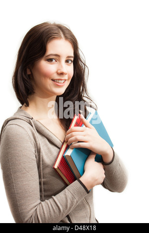 Un attraente studente di college azienda libri isolato su bianco Foto Stock