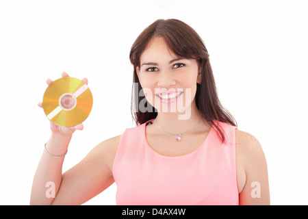 Donna con CD. Su sfondo bianco Foto Stock