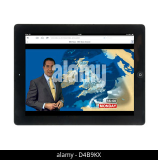 Guarda le previsioni meteo sulla BBC News channel website su un Apple iPad 4 Foto Stock