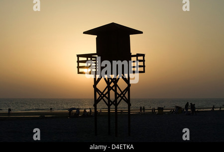 Tramonto sulla spiaggia di Victoria a Cadice, Spagna © Miguel Gomez Foto Stock