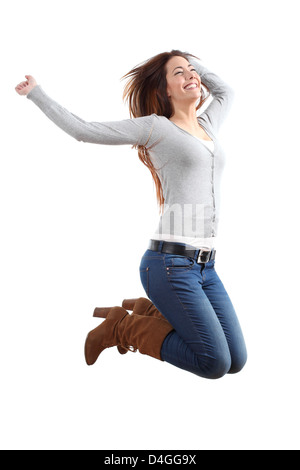 Pretty teen jumping happy con le braccia sollevate su un bianco sfondo isolato Foto Stock