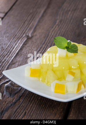 Fresche fatte melata jella su sfondo di legno Foto Stock