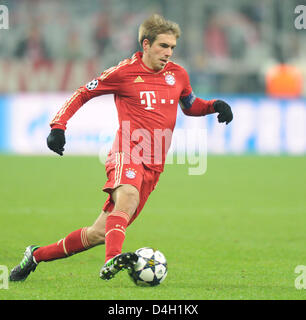 Monaco di Baviera, Germania. 13 marzo 2013. Monaco di Baviera Philipp Lahm in azione durante la UEFA Champions League Soccer round di sedici tra FC Bayern Monaco e Arsenal FC a Fußball Arena München a Monaco di Baviera, Germania, 13 2012. Foto: Marc Müller dpa /Alamy Live News Foto Stock