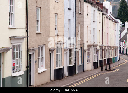 Dipinto di cottages in città back street, ciottoli,strada tra parentesi lampada, conservati edifici Foto Stock