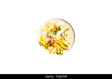 Le Trofie con aragosta, zucchine e fave. Foto Stock