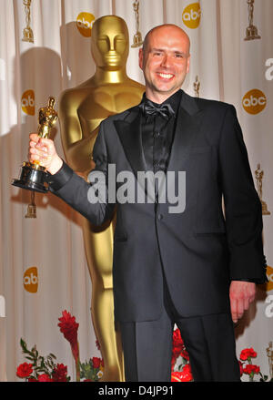 Direttore tedesco Jochen Alexander Freydank accettando l'Oscar per il cortometraggio (Live) Azione per ?Spielzeugland (?Toyland?) pone in sala stampa durante la 81st annuale di Academy Awards il Kodak Theatre di Hollywood e Los Angeles, California, USA, 22 febbraio 2009. Foto: Hubert Boesl Foto Stock