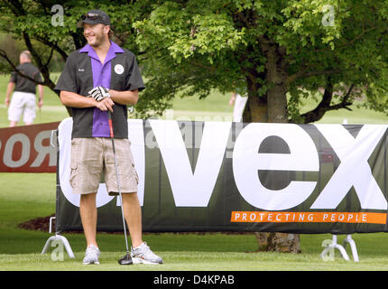 Siamo ski racer Bode Miller ride sul campo da golf di Zell am See, Austria, 14 maggio 2009. Bode Miller partecipa al UVEX &Sci Golf Campionati del Mondo 2009 che avvengono in Zell am See dal 14 maggio fino al 17 maggio 2009. Il concorso è composto da un slalom gigante e due round di golf. Foto: Karl-Josef Hildenbrand Foto Stock