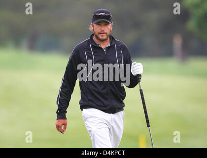 Siamo ski racer Bode Miller passeggiate lungo il campo da golf di Zell am See, Austria, 15 maggio 2009. Bode Miller partecipa al UVEX &Sci Golf Campionati del Mondo 2009 che avvengono in Zell am See dal 14 maggio fino al 17 maggio 2009. Il concorso è composto da un slalom gigante e due round di golf. Foto: Karl-Josef Hildenbrand Foto Stock