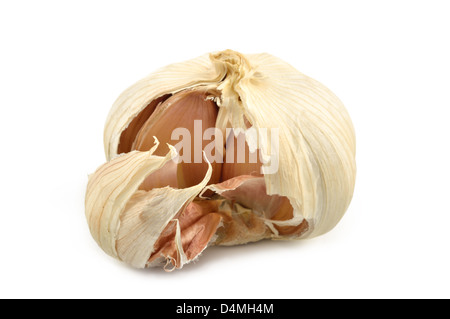 Testa di aglio su uno sfondo bianco di close-up Foto Stock