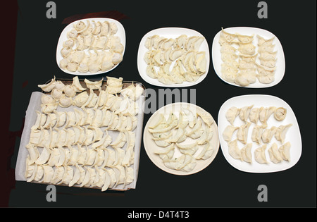 Piastre di gnocchi Cinesi Foto Stock