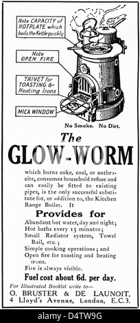 Originale di 1920s periodo vintage annuncio stampa dalla rivista inglese pubblicità il Glow Worm combustibile solido che brucia Stufa Foto Stock