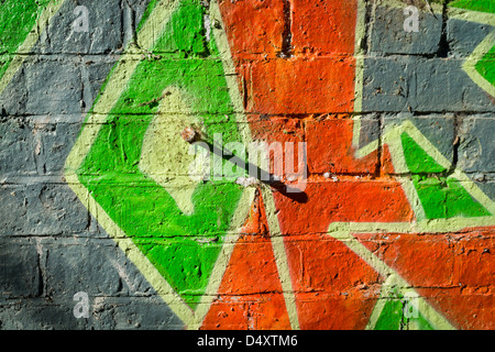 Arte dei graffiti su una parete Foto Stock