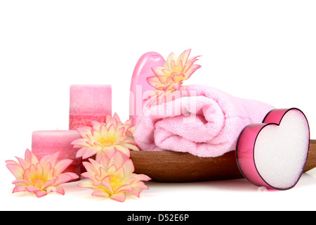 Impostazione di Spa in tono rosa isolato in bianco Foto Stock