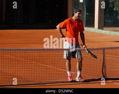 Della Spagna per il giocatore di tennis Rafael Nadal visto durante una sessione di formazione nella sua città natale tennis club Foto Stock
