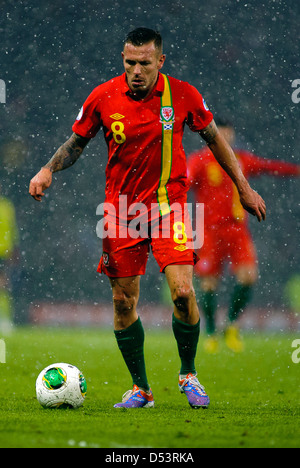 Craig Bellamy in azione durante la Coppa del Mondo di gruppo a un gioco a Hampden Park Stadium Foto Stock