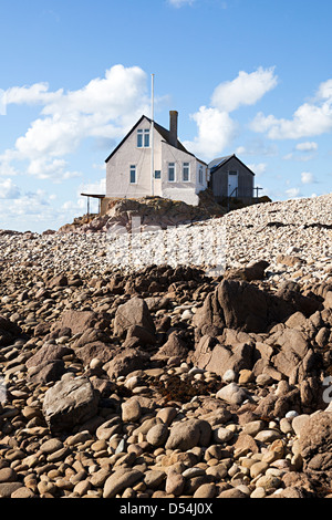 Di pescatori di casa sulla riva del mare su Ecrehous isola Jersey, Isole del Canale, REGNO UNITO Foto Stock