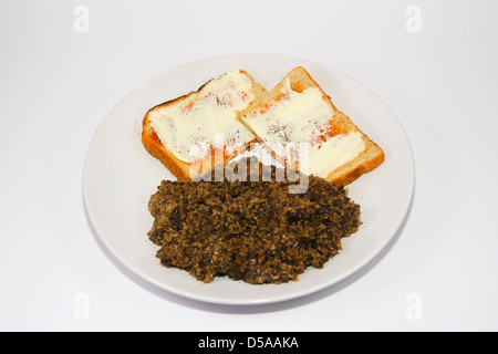 Conserve di haggis con toast imburrato Foto Stock