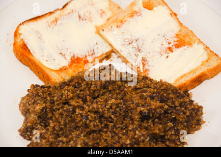 Conserve di haggis con toast imburrato Foto Stock