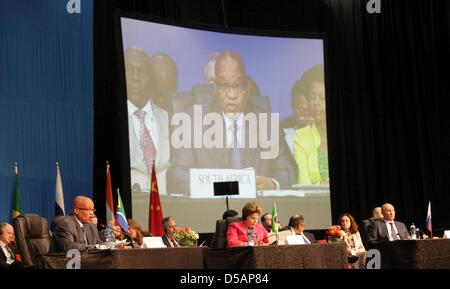 Durban, Sud Africa. Il 27 marzo 2013. Il presidente del Sudafrica Jacob Zuma, il Presidente brasiliano Dilma Rousseff e il Presidente russo Vladimir Putin al Vertice BRICS su Marzo 27, 2013 a Durban, Sud Africa. Il Sud Africa ha ospitato il quinto vertice BRICS a Durban International Convention Centre (ICC) il 26 marzo, 27, 2013. In questo modo si completa il primo ciclo di BRICS vertici. (Foto di Gallo Immagini / Tempi / Thuli Dlamini/Alamy Live News) Foto Stock