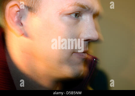 Boxer professionale Juergen Braehmer raffigurato presso la corte distrettuale di Schwerin, Germania, 12 gennaio 2010. Il 31-anno-vecchio Braehmer fu accusato di gravi lesioni corporali e insulto ed è stato condannato a un anno e quattro mesi di reclusione. Presumibilmente, Braehmer ha colpito una donna in faccia e insultato la sua in una discoteca a Schwerin nel 2008. Braehmer, che ha perso il suo peso cruiser world champi Foto Stock