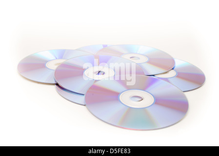 Gran mucchio di blu di CD e DVD isolata contro uno sfondo bianco Foto Stock