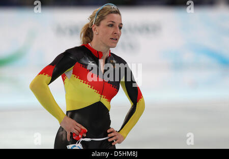 Anni Friesinger-Postma di Germania reagisce dopo la donna 1000 m di pattinaggio di velocità presso il Richmond Olympic Oval durante il Vancouver 2010 Giochi Olimpici, Vancouver, Canada, 18 febbraio 2010. Foto Stock