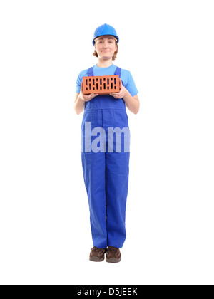 Costruzione femmina Lavoratore che indossa tuta blu e casco azienda mattone su sfondo bianco Foto Stock