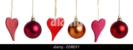 Cuori di natale e baubles su sfondo isolato Foto Stock