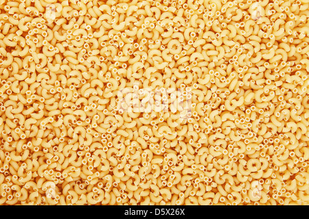 Pasta sfondo texture. La pasta è un alimento di base di cucina tradizionale italiana Foto Stock