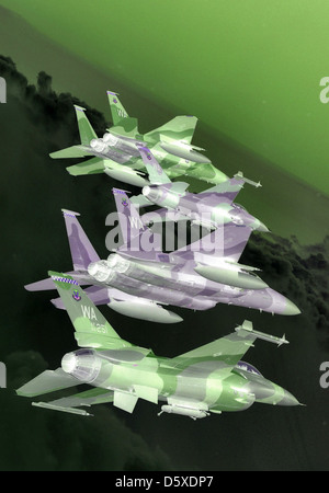 Una formazione di McDonnell Douglas F-15 Eagles e General Dynamics F-16 Fighting Falcons del 64th e 65th Aggressor Squadron esegue manovre sopra i Nevada test and Training Ranges nel 2008. Questi aerei simulano i combattenti nemici per scopi di addestramento. Foto Stock