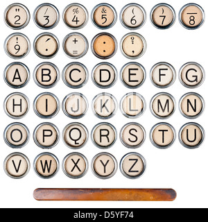Vintage, grunge tasti di una macchina da scrivere, isolato su bianco. Tutto alfabeto lettere di Pentecoste i pulsanti di bordo in argento Foto Stock