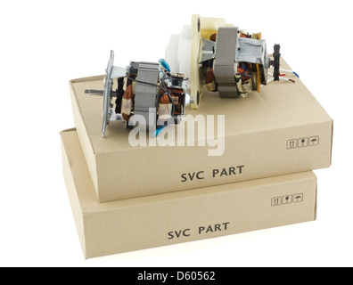 Motori elettrici e scatole di cartone Foto Stock