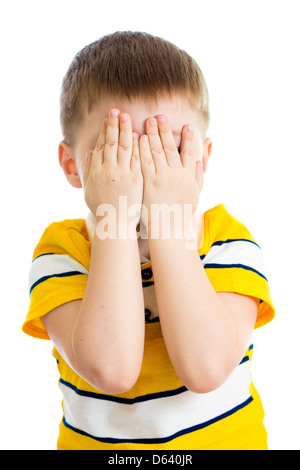 Kid pianto o giocando con la faccia di nascondere isolato Foto Stock