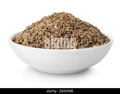 I semi di anice nella piastra isolata su sfondo bianco Foto Stock