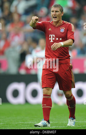 Del Bayern Monaco Bastian SCHWEINSTEIGER reagisce durante la Bundesliga tedesca partita di calcio tra FC Bayern Monaco e VfB Stuttgart nello stadio Allianz Arena di Monaco di Baviera, Germania, 02 settembre 2012. La partita è finita 6-1. Foto: Marc Mueller Foto Stock