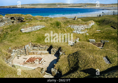 Skara Brae è una pietra insediamento neolitico, situato sulla baia di Skaill sulla costa occidentale del continente di Orkney Foto Stock