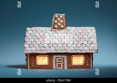 Decorate gingerbread house Foto Stock