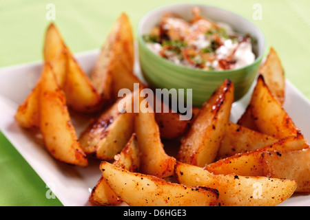 Spicchi di patate Foto Stock