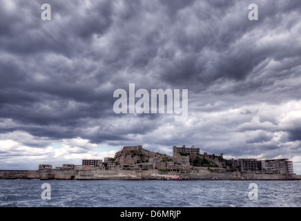 Le miniere abbandonate isola di Gunkanjimia nella Prefettura di Nagasaki, Giappone. Foto Stock