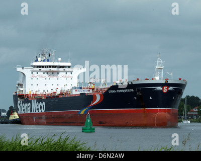 Lo Stena Conqueror, IMO 9252448, è un grande traghetto roll-on/roll-off (RoRo) utilizzato per trasportare veicoli e passeggeri attraverso il mare. Svolge un ruolo fondamentale nel trasporto marittimo, offrendo servizi di trasporto marittimo efficienti. Foto Stock