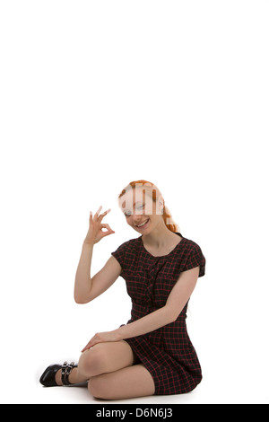 Giovane donna dando gesto perfetto Foto Stock