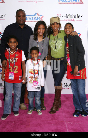 Rodney Peete, Holly Robinson Peete e famiglia T-Mobile Magenta moquette 2011 NBA All-Star Game tenutosi a L.A. Live! Los Foto Stock