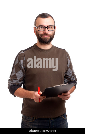 Giovane uomo la scrittura su una clipboard Foto Stock