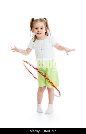 Kid girl divertendosi con hoop isolato Foto Stock