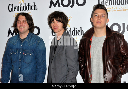 Alex Turner, Matt Helders, Nick O'Malley di Arctic Monkeys Glenfiddich Mojo Honours List 2011 Cerimonia di Premiazione tenutasi presso il Foto Stock