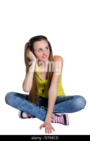 La ragazza di cuffie ascolta musica e risate Foto Stock